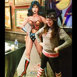 Leah posing in her undies with Wonder Woman